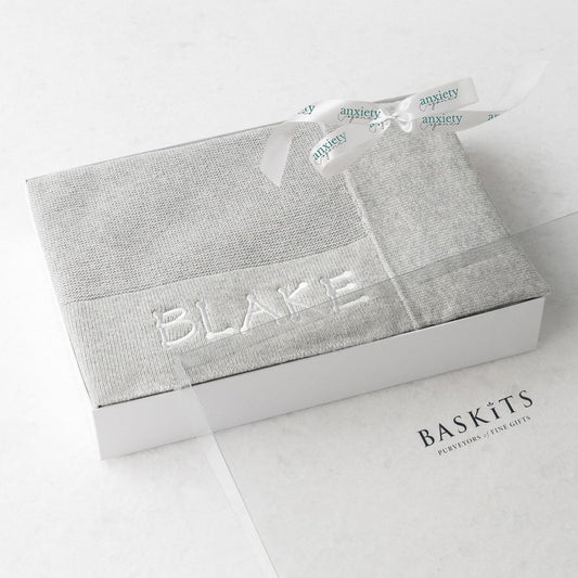 Jake and Jill Customizable Baby Blanket in Gray – 100% natural cotton blanket with custom embroidery, perfect for gender-neutral baby gifts, baby showers, christenings, and newborn gifts. Available in gray, blue, and pink.