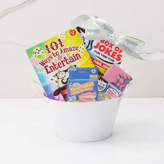 Kids gift basket with chattering teeth, whoopee cushion, and joke book is the perfect Prank and magic trick gift set for children