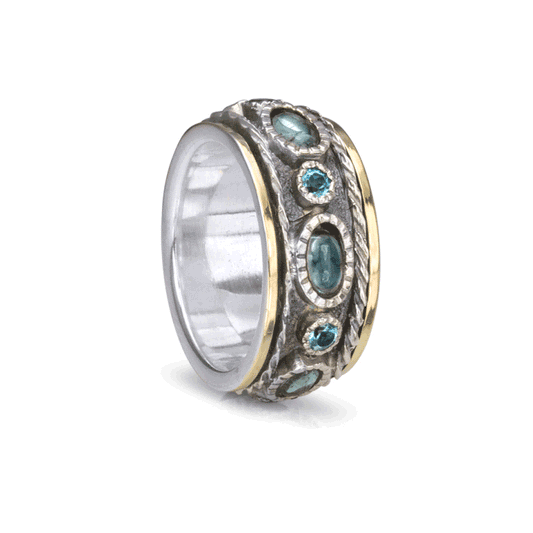 Sky Sterling Silver Crystal Fidget Ring for women with Blue Topaz and Yellow Gold Edges – A unique meditation ring designed for mindfulness, creativity, and inner peace.