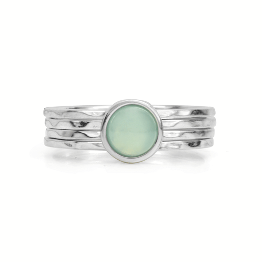Sterling Silver and crystal fidget ring with Green Aventurine Quartz and four spinning bands, displayed with complimentary MeditationRings Tin and Travel Pouch
