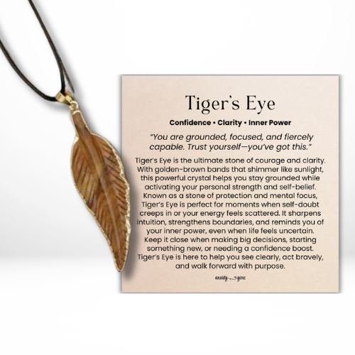 Tiger’s Eye Leaf Gemstone Necklace, healing crystal jewelry for confidence and protection, tiger’s eye leaf pendant for courage and clarity, gemstone necklace for women and men, solar plexus chakra necklace, grounding crystal jewelry, tiger’s eye necklace gift, gemstone jewelry for personal growth and transformation, golden brown healing stone pendant, protection necklace with tiger’s eye crystal