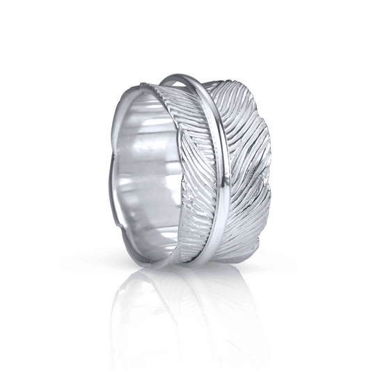 Terra Sterling Silver Agoda Ring with organic leaf pattern and spinning band, displayed with complimentary jewelry tin