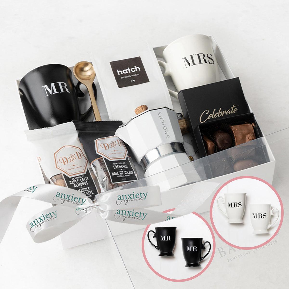 Couples gift basket with mugs, espresso, chocolates, and espresso maker is a Romantic coffee lovers gift set for weddings and anniversaries