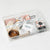 Luxe Serenity Gift Box featuring premium self-care items, bath milk, jade roller, tea, chocolate, and more—perfect for self-care gifts, get well soon gifts, and thank i gift baskets.