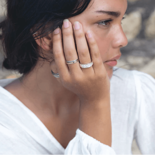Hailey Sterling Silver Worry Ring with hand-carved brushed leaf pattern spinning band, displayed with complimentary MeditationRings Tin