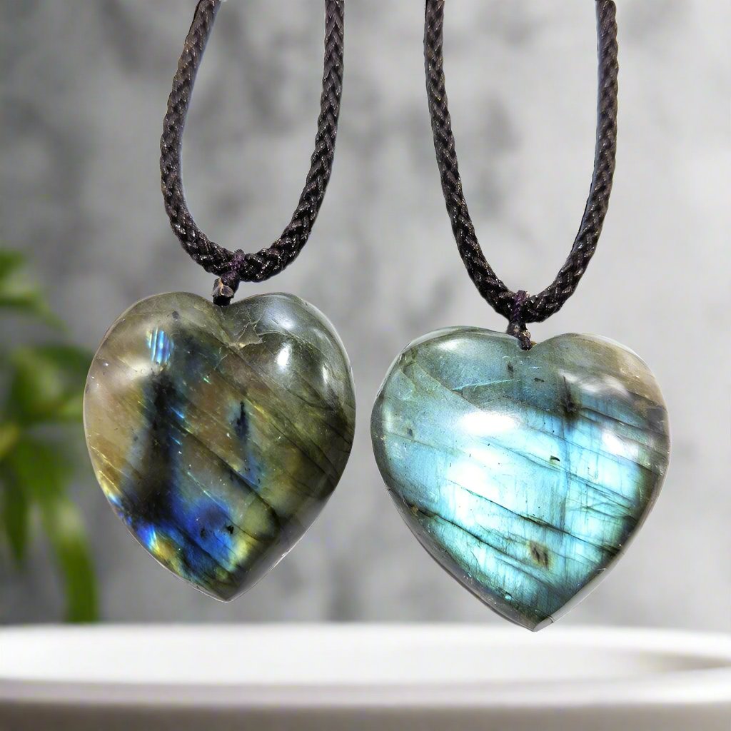 Labradorite Dragon&#39;s Heart Necklace with black adjustable cord for mental clarity and anxiety relief.