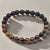 Eye Of The Tiger Crystal Beaded Bracelet with Tiger's Eye and lava beads for mental health and strength.