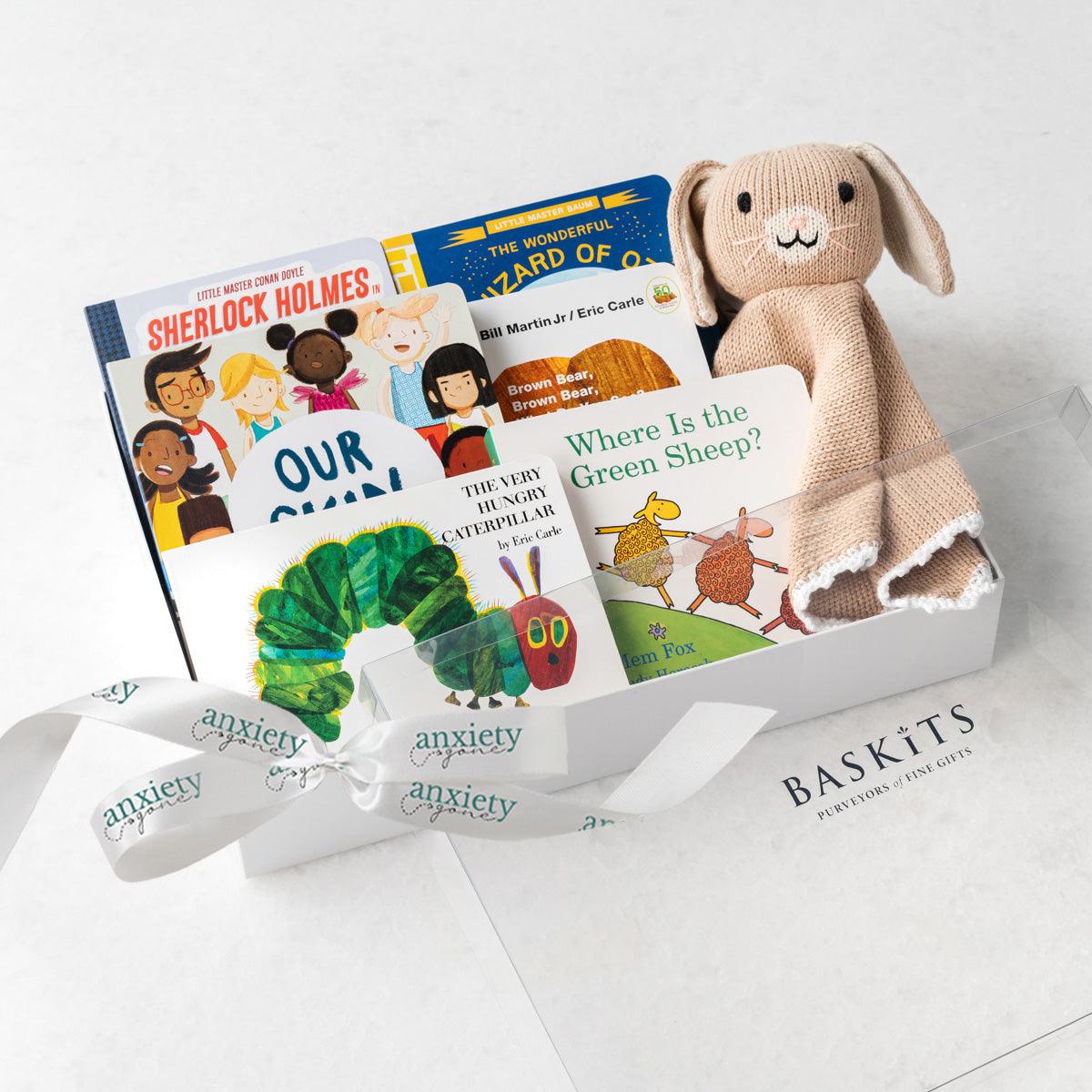 Baby gift basket with classic children’s books and bunny lovie is First library gift set for newborn with 7 storybooks