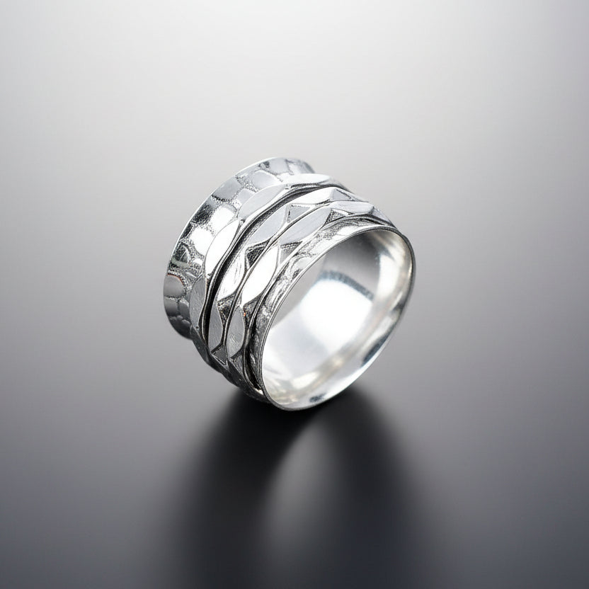 fidget ring, anxiety ring, spinner ring, worry ring, fidget jewelry, fidget ring for anxiety, spinning anxiety ring, anti-anxiety ring, stress relief ring, fidget ring for stress, fidget ring for adults, fidget ring for kids, fidget ring for women, fidget ring for men, discreet fidget ring, fidget ring for focus, fidget ring for work, calming ring for anxiety, ring to reduce stress, mental health support jewelry, stainless steel fidget ring, sterling silver fidget ring, gold spinner ring, minimalist fidget 