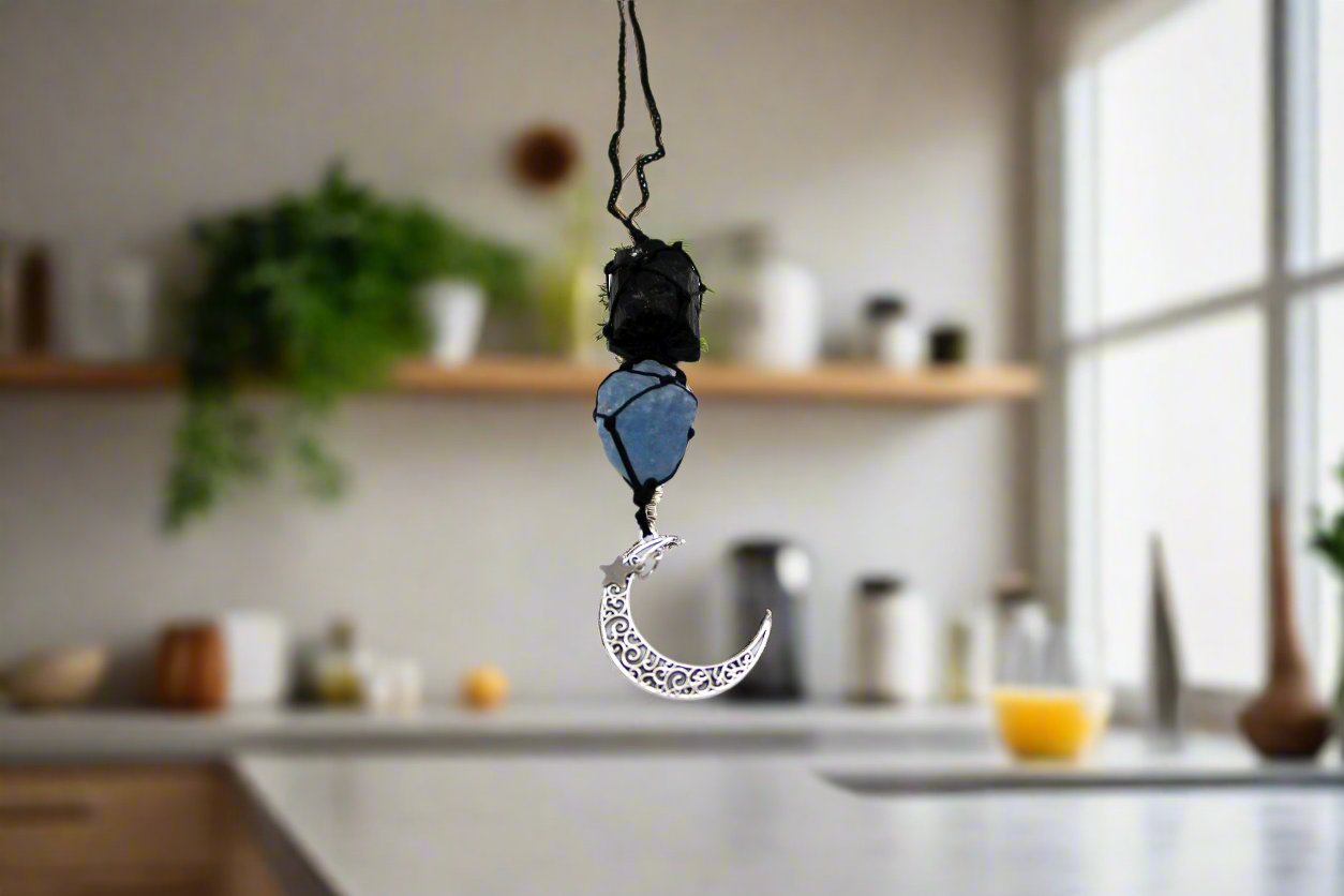 Peaceful Crescent Moon Gemstone Hanging Charm with black tourmaline and celestite, stones for anxiety and inner peace.
