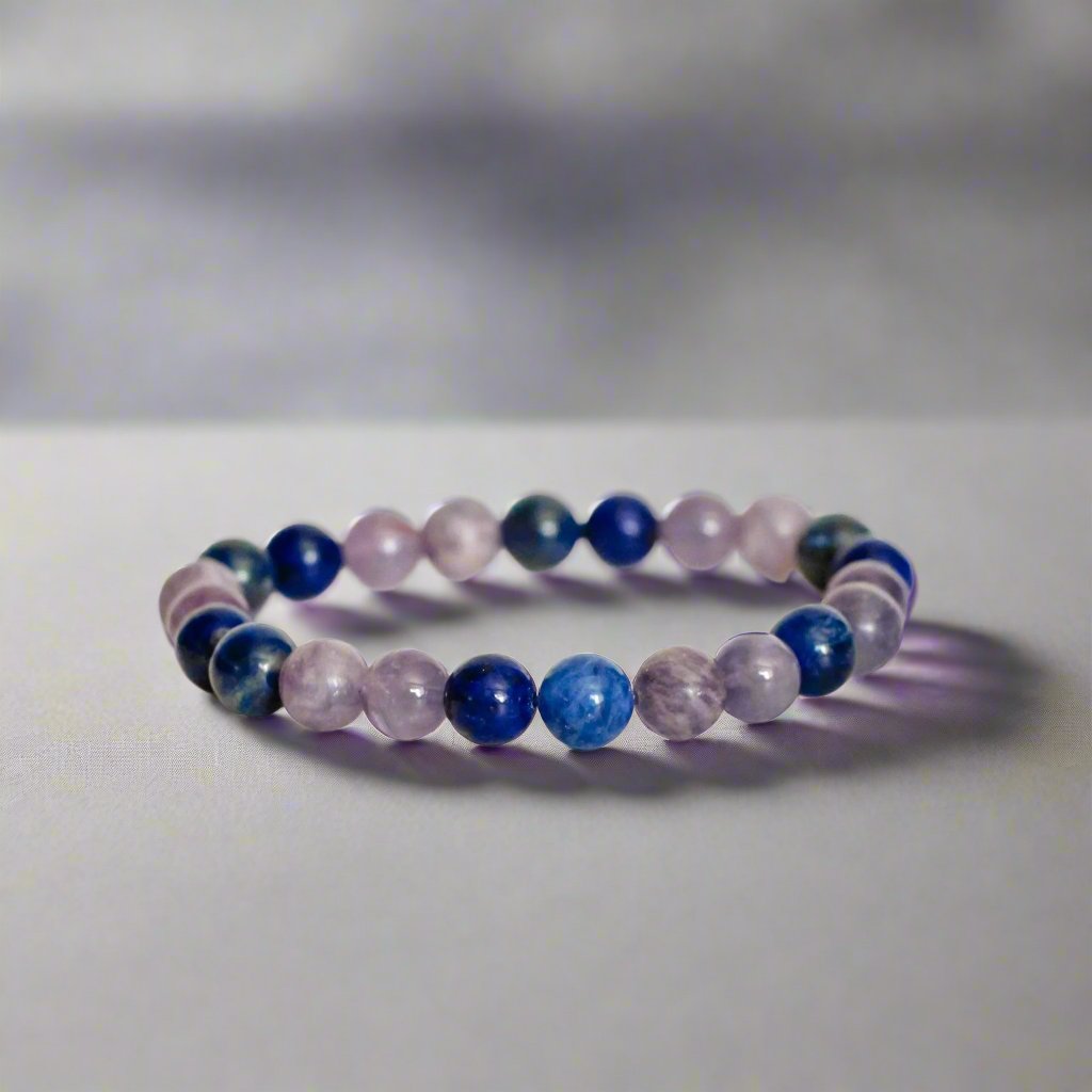 Anti-Agoda Healing Bracelet with the best healing crystals for anxiety, sodalite, amethyst, lapis lazuli, and lepidolite stones for anxiety relief and emotional balance, making it perfect for spiritual gifts. 
