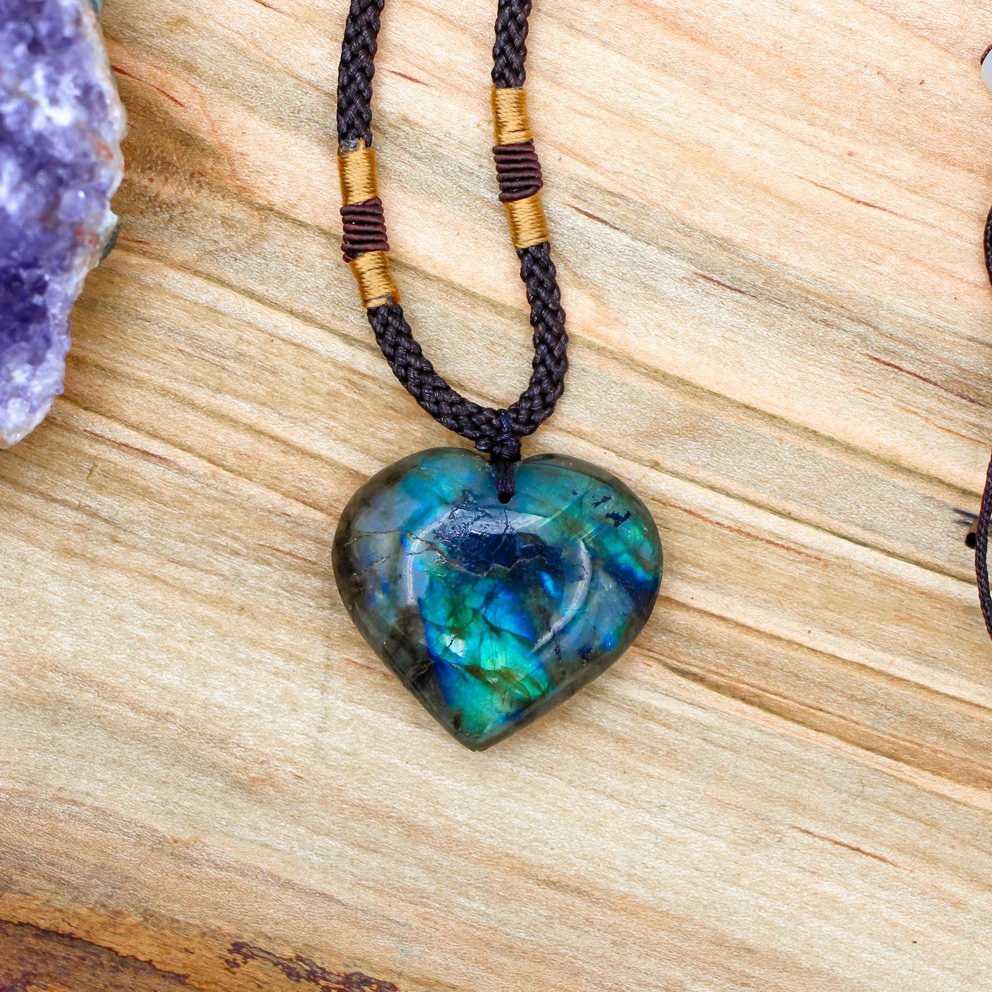 Labradorite Dragon's Heart Necklace with black adjustable cord for mental clarity and anxiety relief.