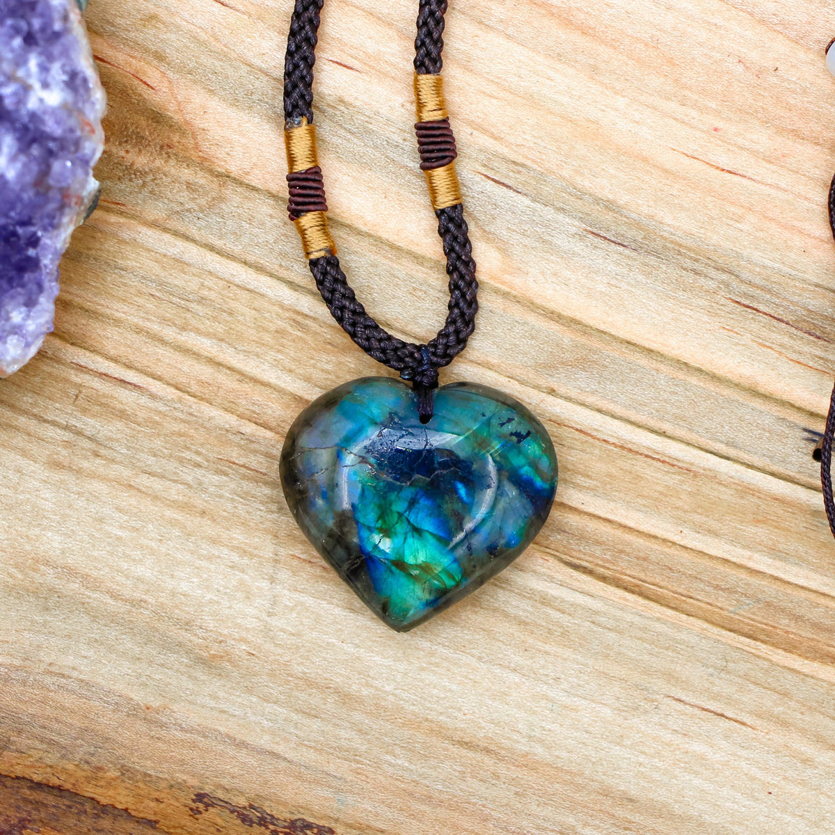 Labradorite Dragon&#39;s Heart Necklace with black adjustable cord for mental clarity and anxiety relief.