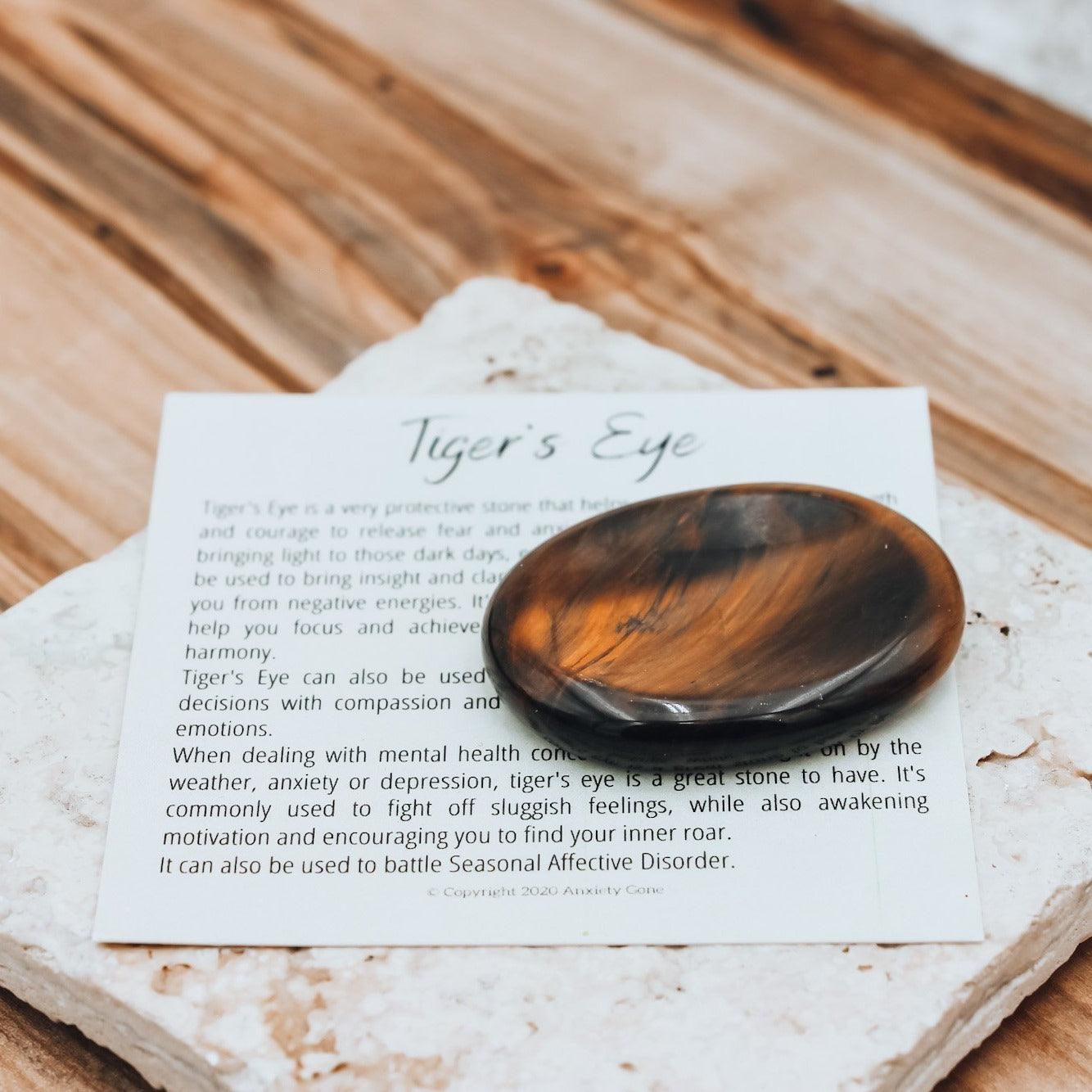 Tiger's Eye Worry Stone for anxiety relief and releasing fear, making it an excellent fidget toy and crystal for anixety.