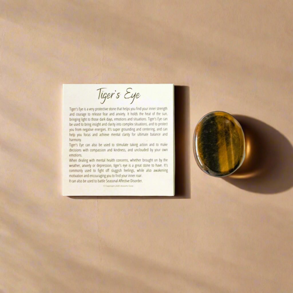 Tiger's Eye Worry Stone for anxiety relief and releasing fear, making it an excellent fidget toy and crystal for anixety.