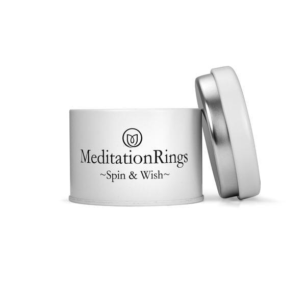 Dream Sterling Silver Meditation Spinning Ring with intricate flower detail and two silver spinning bands, displayed with complimentary tin