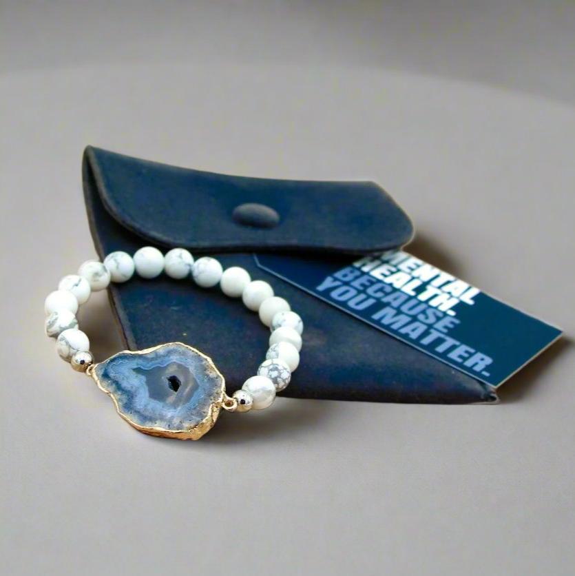 Soothing Snowy White Howlite Bracelet with agate slab, healing stones, and crystals for anxiety.