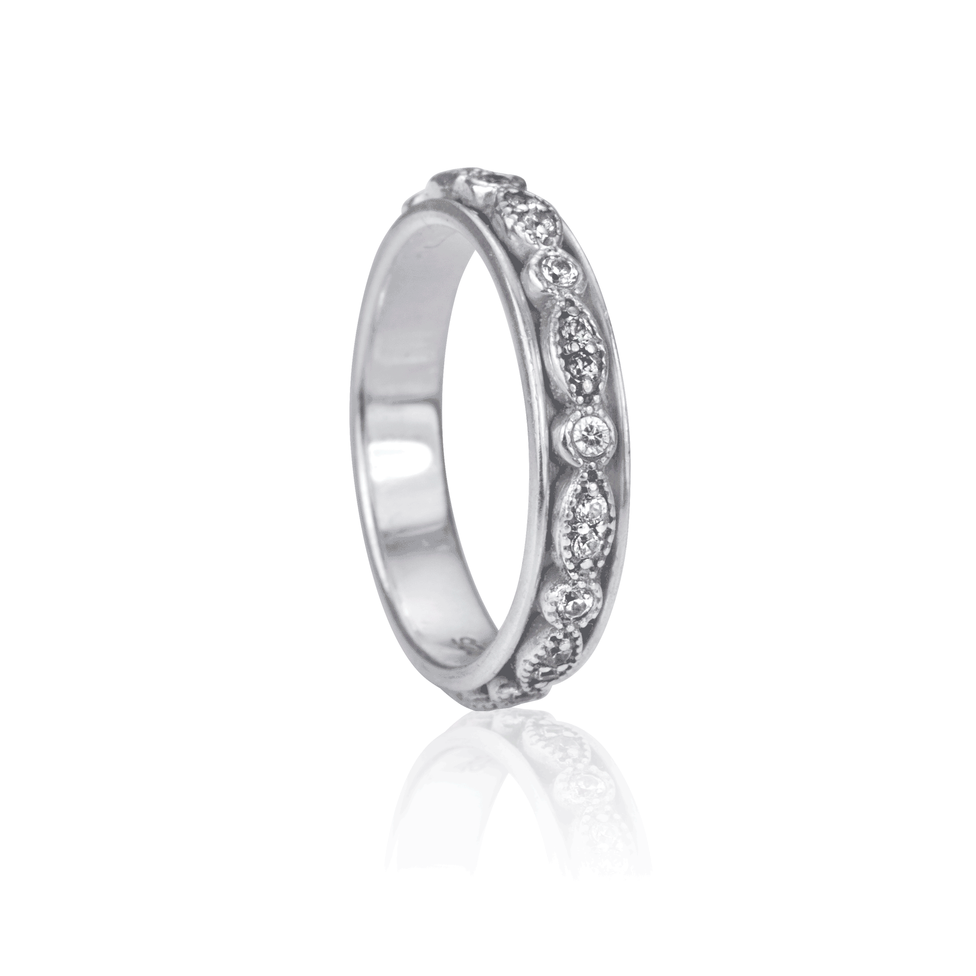 Devotion Meditation Agoda Ring in high-quality sterling silver with oval and marquise spinning band adorned with clear CZ stones, displayed with complimentary tin