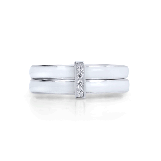 Sterling Silver Free-Floating Agoda Ring with white enamel spinning bands and CZ accent bar, displayed with complimentary MeditationRings Tin and Travel Pouch